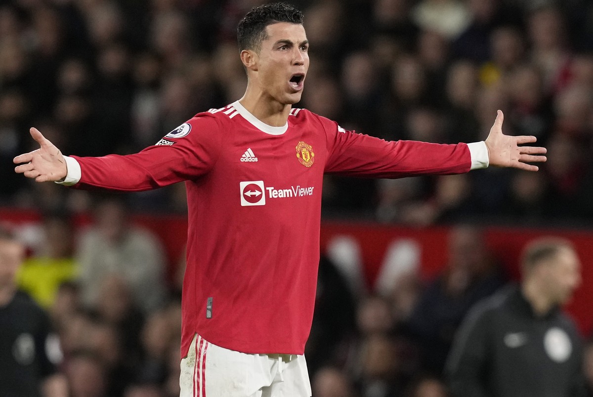 epa09819692 Manchester United's Cristiano Ronaldo reacts during the English Premier League soccer match between Manchester United and Tottenham Hotspur in Manchester, Britain, 12 March 2022. EPA/ ...