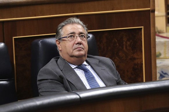 epa06217309 Spanish Interior Minister, Juan Ignacio Zoido, attends a parliamentary session held in the Lower House in Madrid, Spain, 21 September 2017, about the Catalonian referendum. Up to 14 people ...