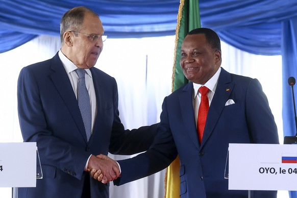 In this photo released by Russian Foreign Ministry Press Service, Russian Foreign Minister Sergey Lavrov, left, and Congo&#039;s Foreign Minister Jean Claude Gakosso shake hands after a joint news con ...