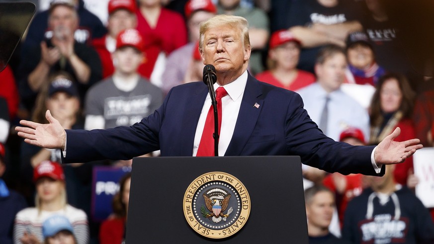 epa08210053 US President Donald Trump speaks during an election rally before the New Hampshire Primary at Southern New Hampshire University Arena in Manchester, New Hampshire, USA, 10 February 2020. T ...