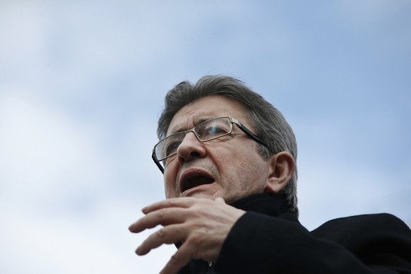 French Left party leader and candidate for the 2017 French presidential election, Jean-Luc Melenchon makes a speech from a barge on the canal de l&#039;Ourcq, in Paris, Monday, April 17, 2017. Melench ...