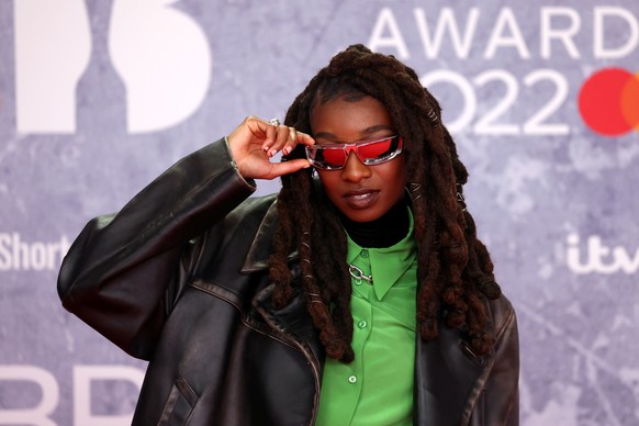 epa09739141 Little Simz arrives for the 42nd Brit Awards ceremony at The O2 Arena in London, Britain, 08 February 2022. The annual pop music awards are presented by the British Phonographic Industry ( ...