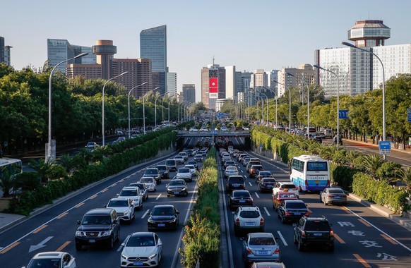 epa10113377 Vehicles maneuver along in traffic in Beijing, China, 09 August 2022 (issued 10 August 2022). China&#039;s Consumer Price Index (CPI) in July rose by 2.7 percent on an annual basis, up fro ...