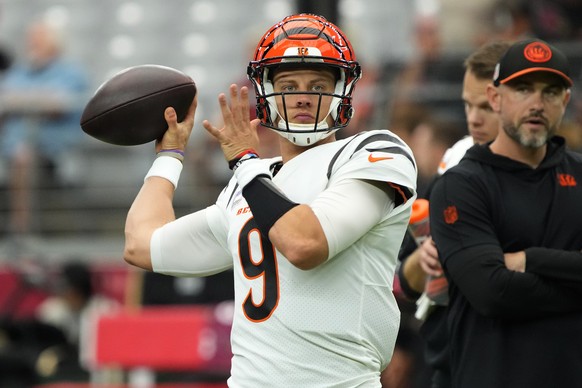 Cincinnati Bengals quarterback Joe Burrow (9) warms up prior to an NFL football game against the Arizona Cardinals, Sunday, Oct. 8, 2023, in Glendale, Ariz. (AP Photo/Rick Scuteri)