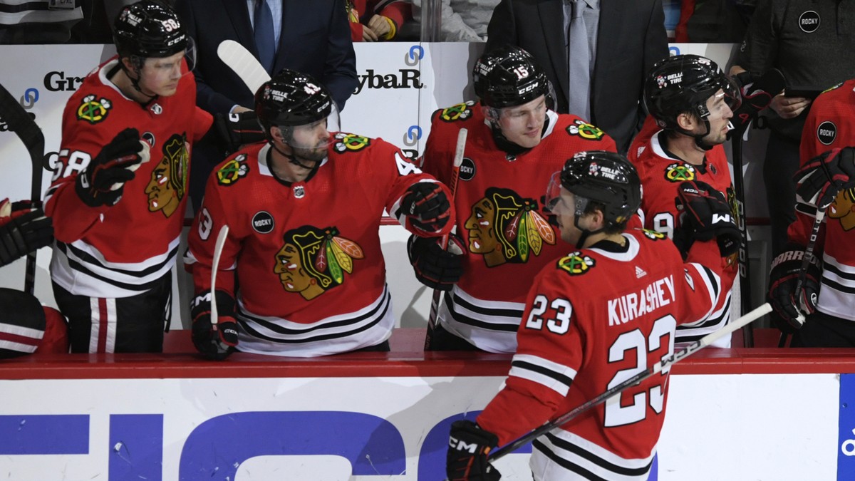 Chicago Blackhawks' Philipp Kurashev (23) is congratulated for a goal against the Anaheim Ducks during the second period of an NHL hockey game Tuesday, March 12, 2024, in Chicago. (AP Photo/Paul  ...