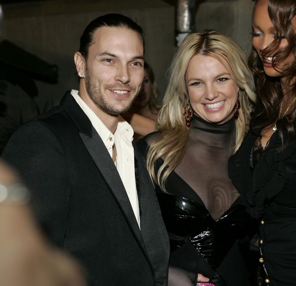 Kevin Federline, left, Britney Spears, center, and supermodel Tyra Banks pose together as they arrive for the LG Mariah Carey and Jermaine Dupri Post Grammy Party at a private residence Wednesday, Feb ...