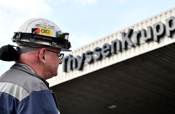 epa07560448 (FILE) - A steel worker stands in front of Gate 1 of the headquarters of German steel maker ThyssenKrupp Steel Europe in Duisburg, Germany, 20 September 2017 (reissued 10 May 2019). Report ...