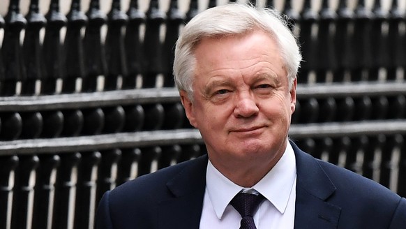 epa06370999 Brexit Secretary David Davis departs Downing Street for Prime Ministers Questions in London, Britain, 06 December 2017. David Davis gave evidence to Commons Brexit Committee, 06 December 2 ...