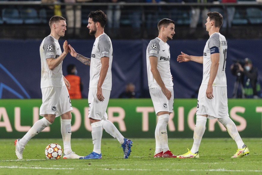 epa09560473 Young Boys&#039; Michel Aebischer, Jordan Lefort, Quentin Maceiras and Christian Fassnacht, from left, react after the UEFA Champions League group F soccer match between Villarreal CF of S ...