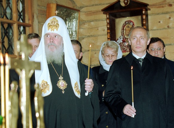 Putin mit dem Kopf der russisch-orthodoxen Kirche, dem Patriarchen Alexey von Moskau.&nbsp;