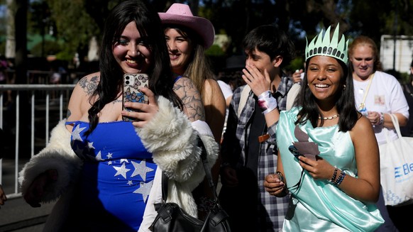 Fans make their way to the Monumental stadium to attend Taylor Swift: The Eras Tour concert, in Buenos Aires, Argentina, Thursday, Nov. 9, 2023. (AP Photo/Natacha Pisarenko)
