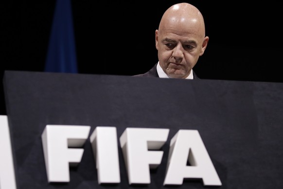 FILE - FIFA President Gianni Infantino walks on the stage before the start of the 69th FIFA congress in Paris, Wednesday, June 5, 2019. FIFA was facing more opposition to its newly-expanded Club World ...