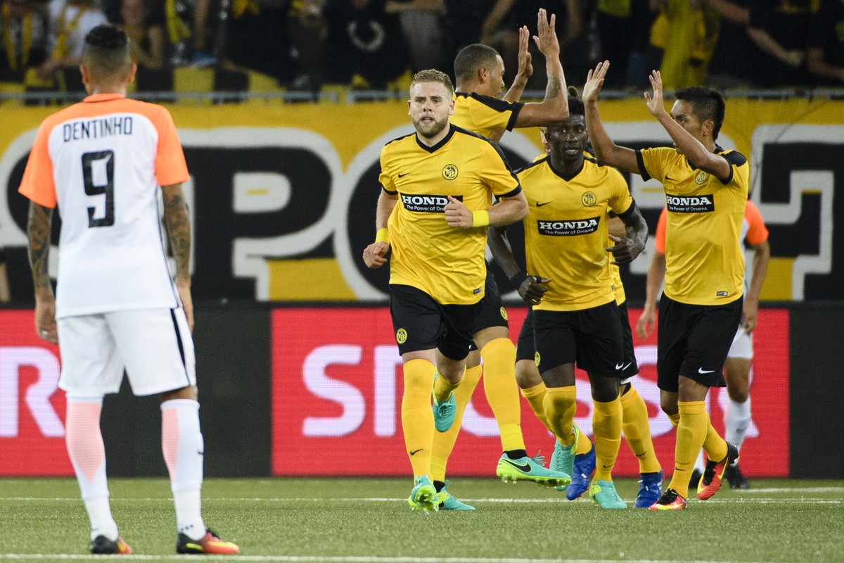 Switzerland's BSC Young Boys cheer after the score to 1-0 during a UEFA Champions League third qualifying round second leg match between Switzerland's BSC Young Boys and Ukraine's FC Sh ...