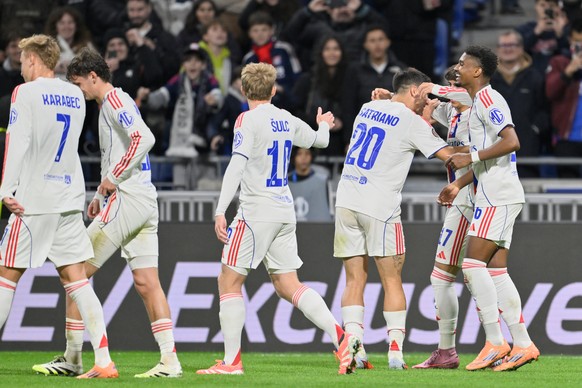 Lyon players celebrate the second goal from teammate Lyon&#039;s Afonso Moreira against Basel during the Europa League phase soccer match between Lyon and Basel in Decines-Charpieu outside Lyon, Franc ...