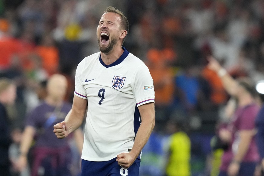 England&#039;s Harry Kane celebrates after winning a semifinal match between the Netherlands and England at the Euro 2024 soccer tournament in Dortmund, Germany, Wednesday, July 10, 2024. (AP Photo/Fr ...