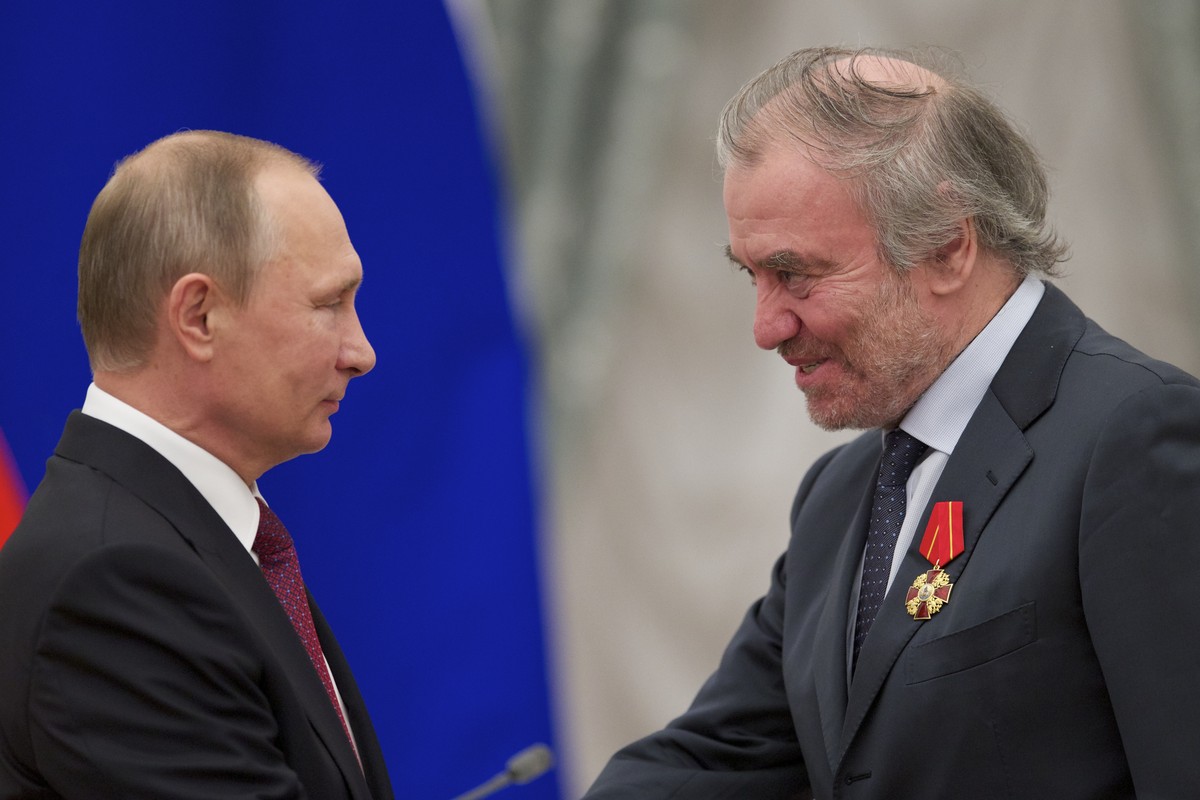 FILE - Russian President Vladimir Putin, left, presents a medal to then Mariinsky Theatre's Artistic Director Valery Gergiev, during an awarding ceremony in Moscow's Kremlin, Russia, Thursda ...