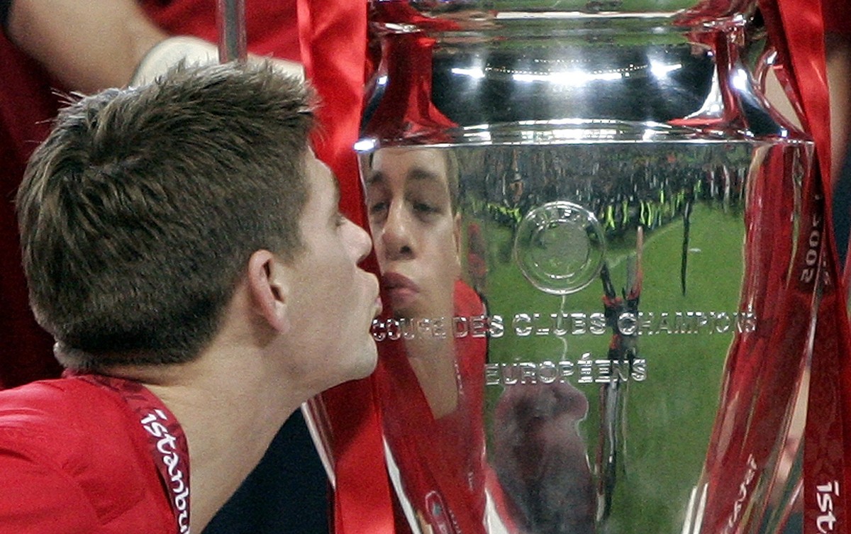 Liverpool's captain Steven Gerrard kises the trophy after Liverpool's victory in the the UEFA Champions League Final between AC Milan and Liverpool at the Ataturk Olympic Stadium in Istanbul ...