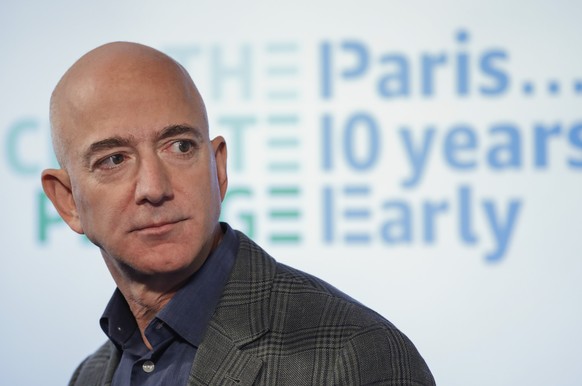 FILE - In this Sept. 19, 2019, file photo, Amazon CEO Jeff Bezos speaks during his news conference at the National Press Club in Washington. A pledge by nine grantmakers to give $5 billion to conserva ...