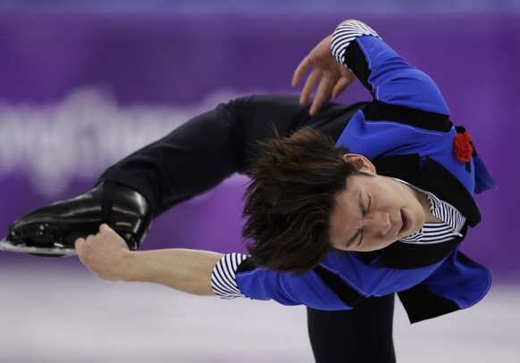 Keiji Tanaka of Japan performs during the men&#039;s free figure skating final in the Gangneung Ice Arena at the 2018 Winter Olympics in Gangneung, South Korea, Saturday, Feb. 17, 2018. (AP Photo/Bern ...