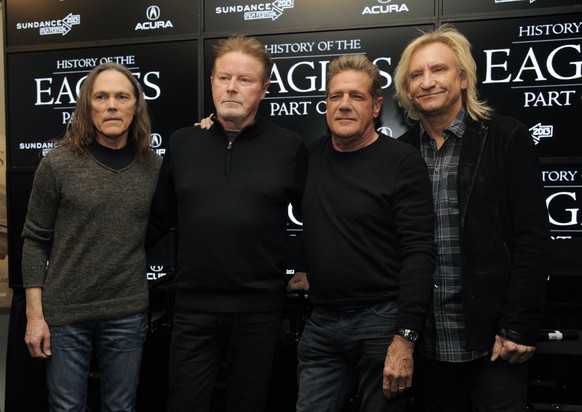 FILE - In this Jan.19, 2013 file photo, from left, Timothy B. Schmit, Don Henley, Glenn Frey and Joe Walsh of The Eagles pose together after a news conference in Park City, Utah. This year’s Kennedy C ...