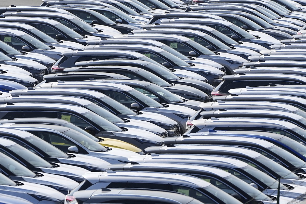New German cars are stored at a logistic center in Duisburg, Germany, Thursday, March 27, 2025. (AP Photo/Martin Meissner)
Germany Cars US Tariffs