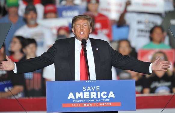 epa09515988 Former US President Donald J. Trump speaks with supporters at a Save America rally at the Iowa State Fairgrounds in Des Moines, Iowa, USA, 09 October 2021. The rally highlights Trumps firs ...