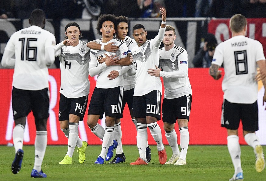 Germany&#039;s Antonio Ruediger, Nico Schulz, Leroy Sane, Thilo Kehrer, Serge Gnabry, Timo Werner and Toni Kroos, from left, celebrate the second goal by Sane during the UEFA Nations League soccer mat ...