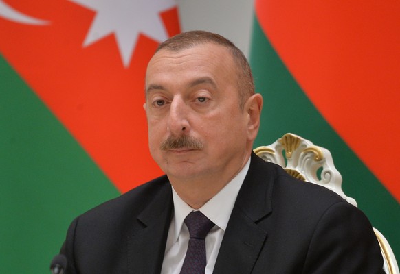 epa07177570 Azerbaijan&#039;s President Ilham Aliev looks on during his meeting with Belarussian President Alexander Lukashenko (unseen), in the Palace of Independence in Minsk, Belarus, 19 November 2 ...