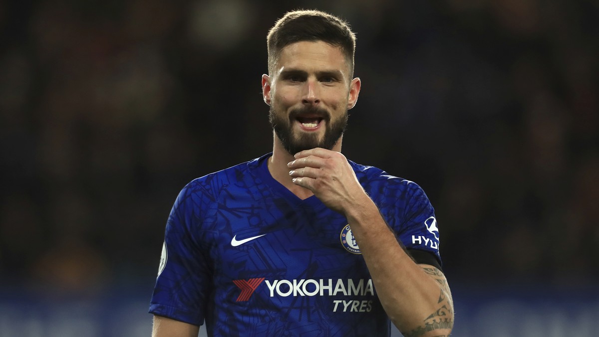 Chelsea's Olivier Giroud walks on the pitch the English Premier League soccer match between Chelsea and West Ham at Stamford Bridge Stadium in London, England, in London, England, Saturday, Nov.  ...