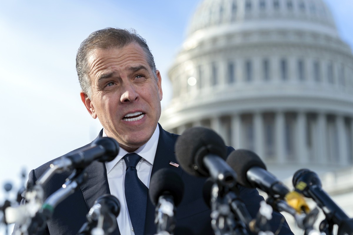 Hunter Biden, son of U.S. President Joe Biden, talks to reporters at the U.S. Capitol, in Washington, Dec. 13, 2023. Prosecutors say a former FBI informant charged with making up a multimillion-dollar ...