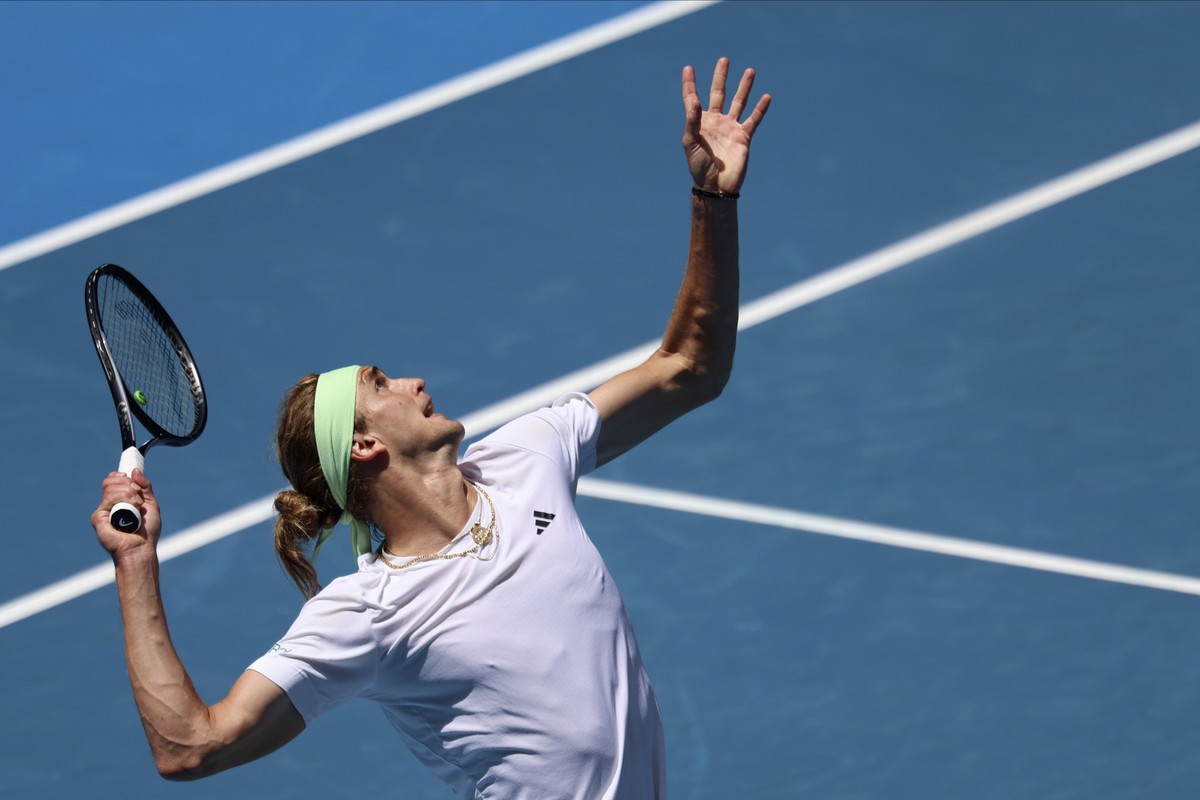 Alexander Zverev of Germany serves to Lukas Klein of Slovakia during their second round match at the Australian Open tennis championships at Melbourne Park, Melbourne, Australia, Thursday, Jan. 18, 20 ...