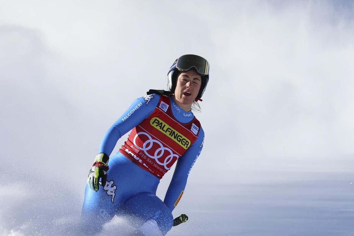 Italy's Sofia Goggia crosses the finish line during an alpine ski, women's World Cup downhill race, in Zauchensee, Austria, Saturday, Jan. 15, 2022. (AP Photo/Marco Trovati)