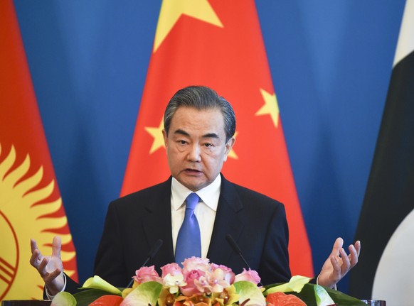 Chinese Foreign Minister Wang Yi speaks during a press conference after a meeting of foreign ministers and officials of the Shanghai Cooperation Organization (SCO) at the Diaoyutai State Guesthouse in ...