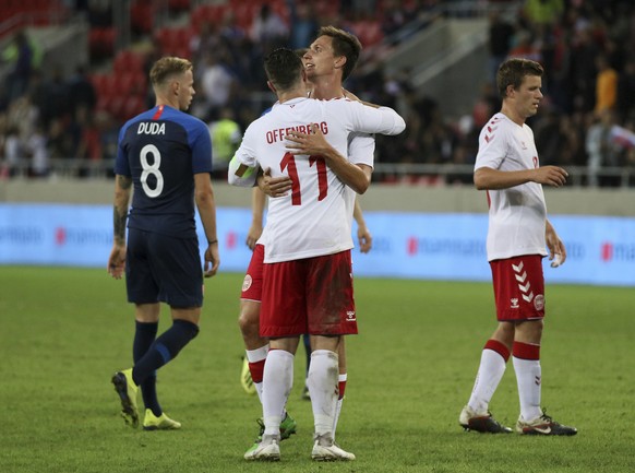 Danish players embrace after losing a friendly soccer match between Slovakia and Denmark in Trnava, Slovakia, Wednesday, Sept. 5, 2018. Every player in Denmark&#039;s squad are uncapped following a di ...