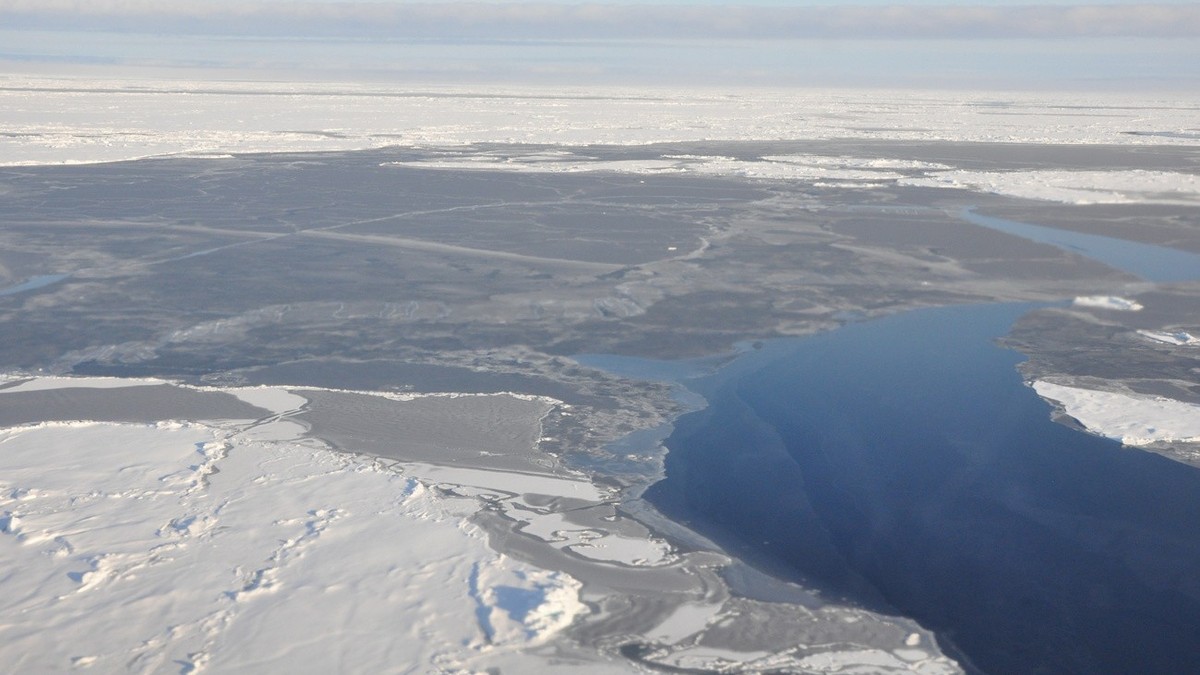 This 2014 photo provided by NOAA shows the Arctic ice coverage. Earth's icy northern region lost more of its signature whiteness that reflects the sun's heat. It was replaced temporarily wit ...