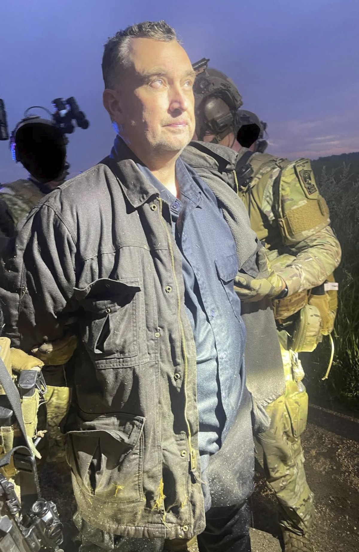 This photo made available by the Ramsey County Sheriff's Office shows Vance Luther Boelter, the man accused of assassinating the top Democrat in the Minnesota House, as he was arrested late Sunda ...