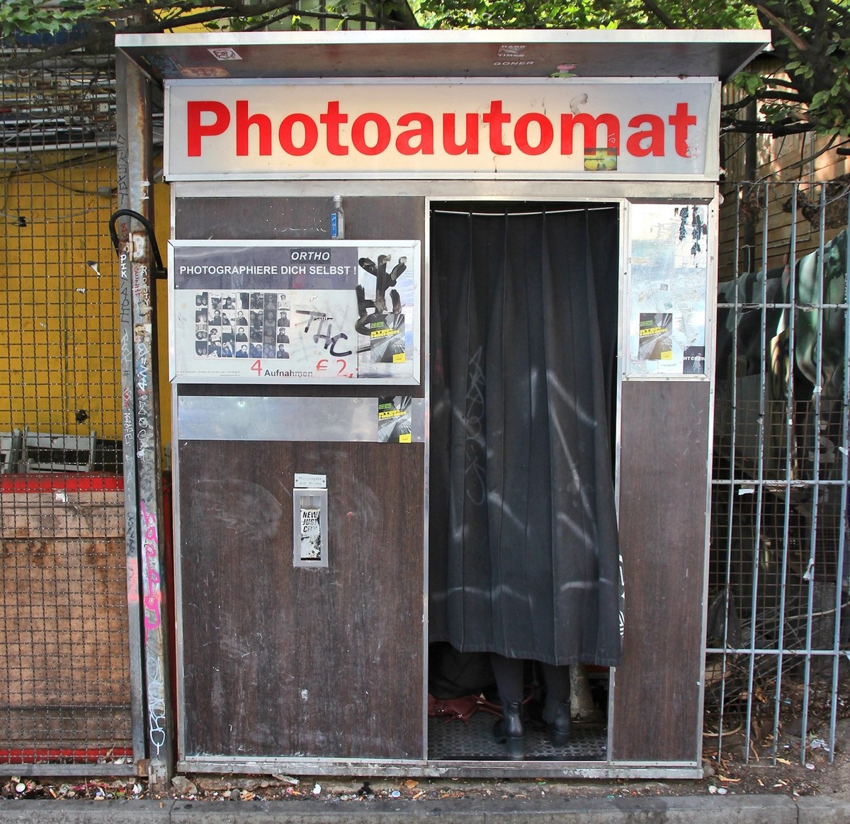 BERLIN, GERMANY - AUGUST 26, 2014: Typical photo booth in Wrangelkiez area of Kreuzberg district in Berlin. Photoautomats of Berlin are among its most typical tourism attractions.