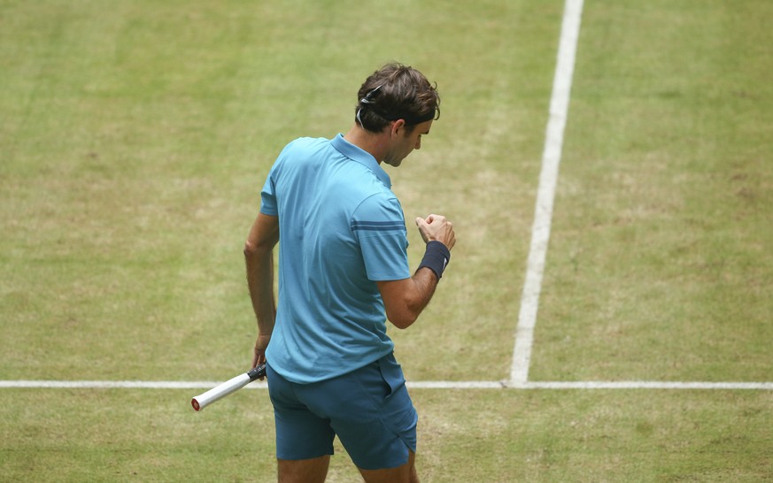 Roger Federer reacts during his semi final match against Denis Kudla at the Gerry Weber Open ATP tennis tournament in Halle, Germany, Saturday, June 23, 2018. (Friso Gentsch/dpa via AP)