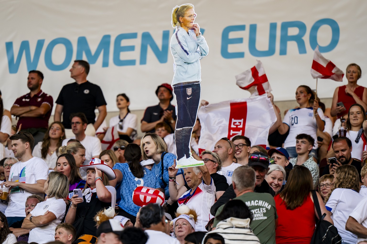 A British fan holds a cardboard poster of England&#039;s head coach Sarina Wiegman the UEFA Women&#039;s EURO 2025 semi final soccer match between England and Italy at the Stade de Geneve stadium in G ...