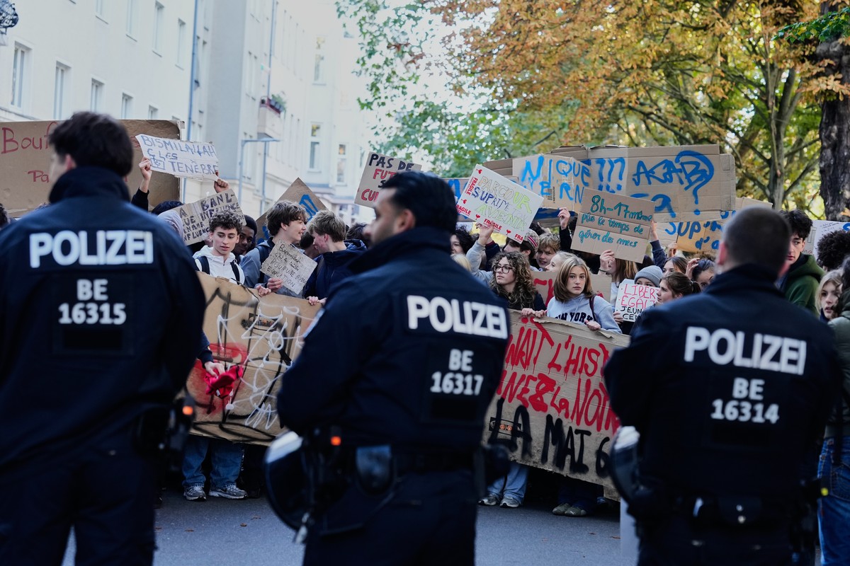 Police officers stand in front of students of the Lycee Francais Berlin during a school protest in Berlin, Germany, Monday, Oct. 12, 2026. (AP Photo/Markus Schreiber)
Germany France School Protest