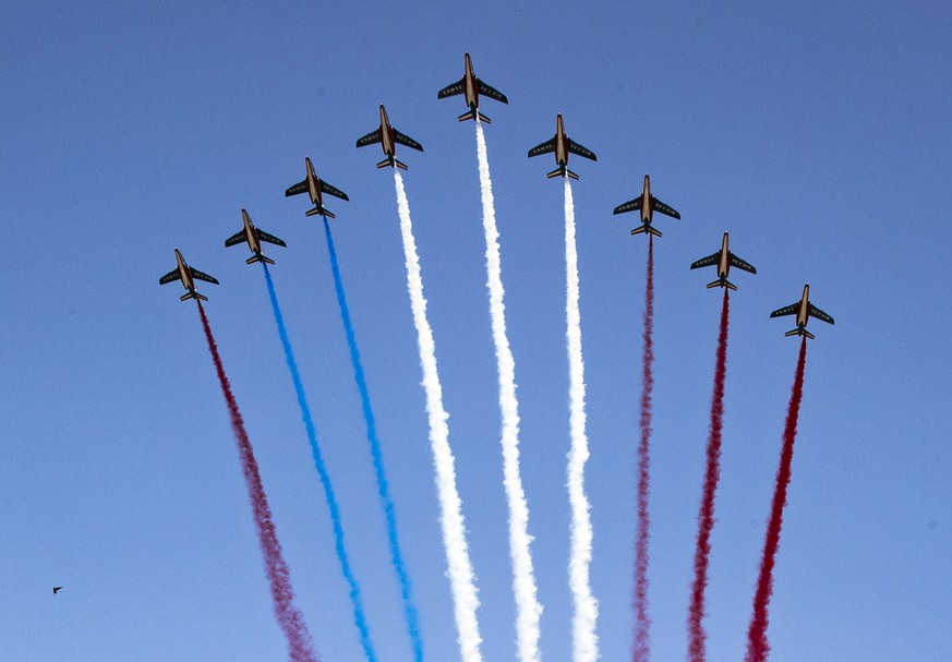 epa06887907 An error occurred in the colors of the French flag (Red,Blue, white, red) produced by the fumes of the &#039;Patrouille de France during the traditional Bastille Day military parade in Par ...