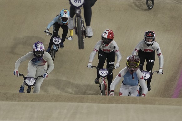 From left, Axelle Etienne of France, Aiko Gommers of Belgium, Nadine Aeberhard of Switzerland, Molly Simpson of Canada and Zoe Claessens of Switzerland, compete in the women&#039;s BMX racing event, a ...