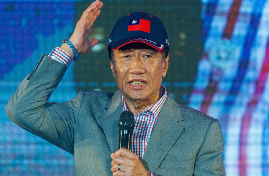 epa10622713 Foxconn founder Terry Gou speaks to a rally as he seeks the presidential nomination of the Kuomintang (KMT) in New Taipei City, Taiwan May 12, 2023. The Foxconn founder pledged at his rally...