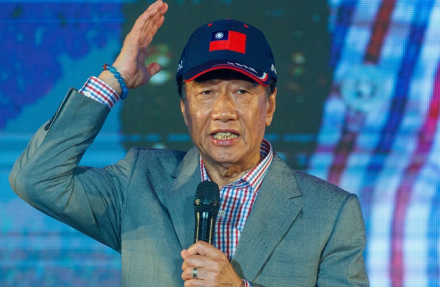 epa10622713 Foxconn founder Terry Gou speaks to a rally as he seek the presidential nomination of the Kuomintang (KMT) in New Taipei City, Taiwan, 12 May 2023. The Foxconn founder promised at his rall ...