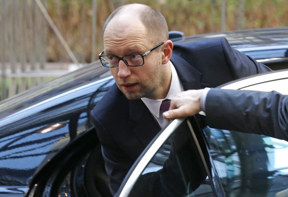 Ukraine's Prime Minister Arseniy Yatsenyuk arrives at a European leaders emergency summit on the situation in Ukraine, in Brussels March 6, 2014. European Union leaders were set to warn but not sanction Russia on Thursday over its military intervention in Ukraine after Moscow rebuffed Western diplomatic efforts to persuade it to pull forces in Crimea back to their bases. REUTERS/Pascal Rossignol (BELGIUM - Tags: MILITARY POLITICS)