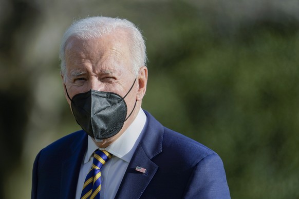 President Joe Biden walks on the South Lawn of the White House after stepping off Marine One, Thursday, Feb. 10, 2022, in Washington. Biden is returning from Culpeper, Va., where he promoted his admin ...