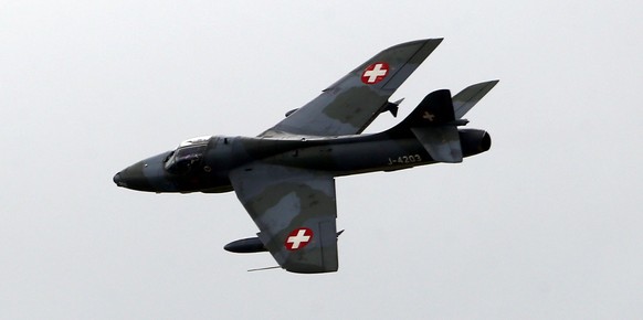 (L-R) Swiss Air Force historic aircrafts DH-115 Vampire, F-5 Tiger, Hunter and Mirage III perform during the Air14 airshow at the airport in Payerne August 31, 2014. The Swiss Air Force celebrates the ...