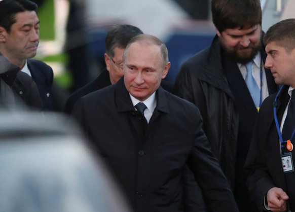 Russian President Vladimir Putin arrives at Yamaguchi Ube Airport in Ube, Japan, December 15, 2016. REUTERS/Koji Sasahara/Pool