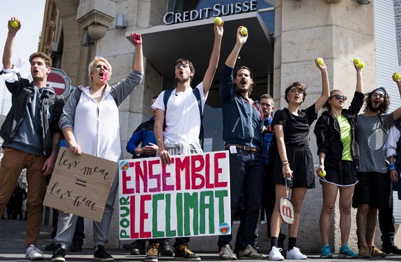 Thousands of students demonstrate front of the Credit Suisse bank during a « Climate strike » protest in Lausanne, Switzerland, Friday, May 24, 2019. Students from several countries worldwide plan to  ...