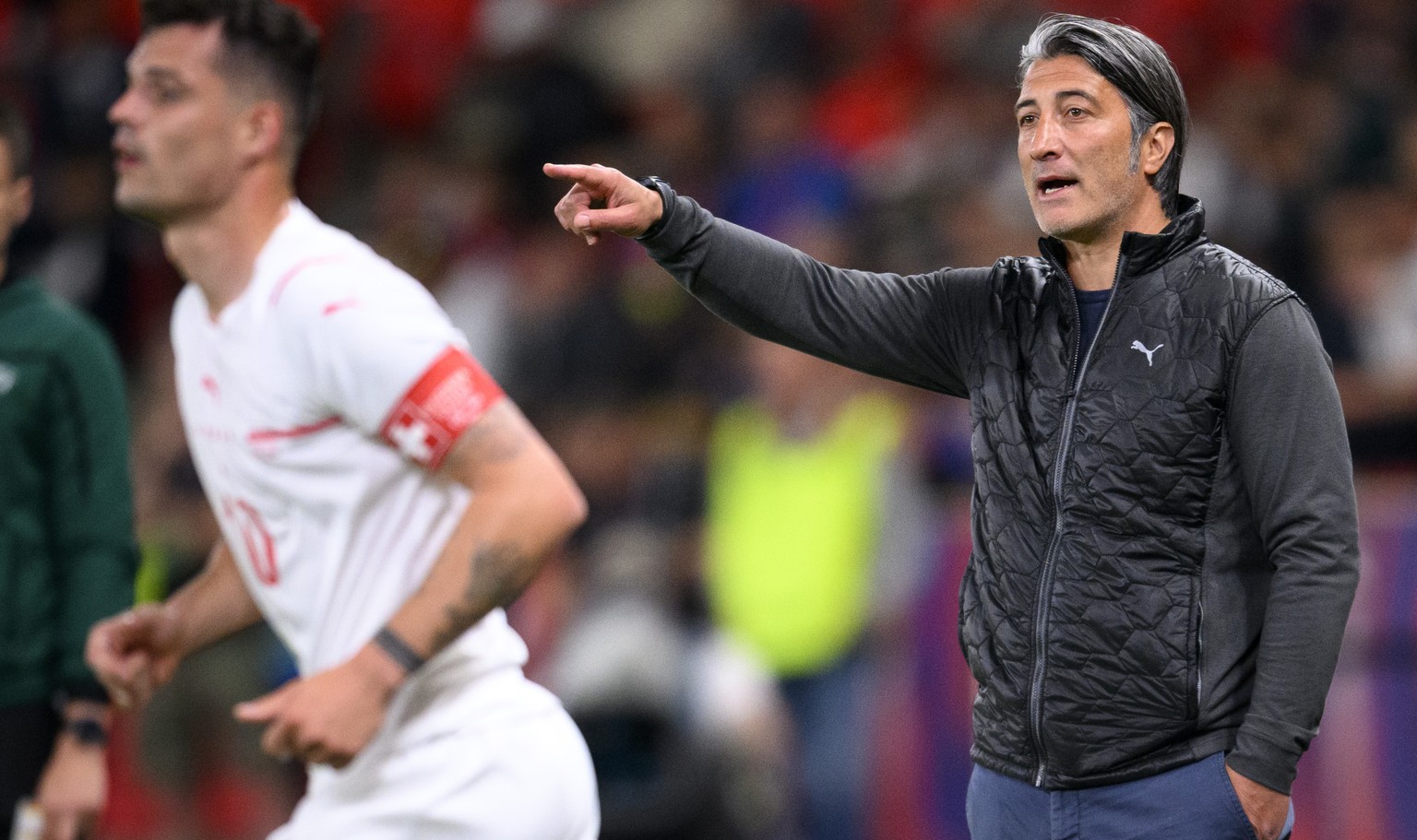 Switzerland&#039;s head coach Murat Yakin, right, gestures next to Switzerland&#039;s midfielder Granit Xhaka, left, during the UEFA Nations League group A2 soccer match between Czech Republic and Swi ...